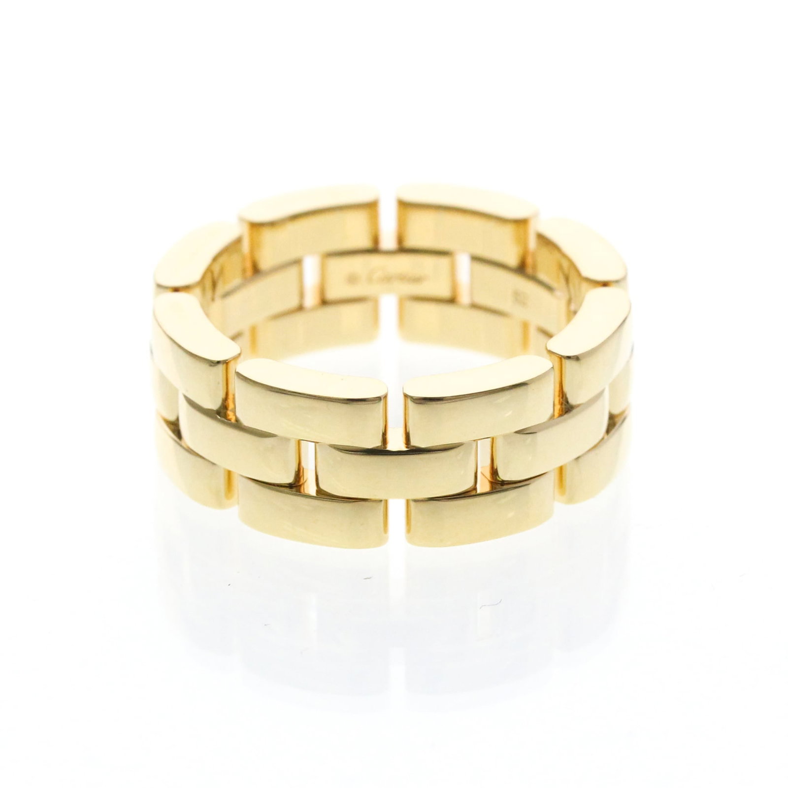CARTIER Band Ring Yellow Gold (18K): CARTIER Band Ring Yellow Gold (18K) Yellow gold (18K) Cartier Band Ring with elegant Maillon Panthre style, featuring a slender 7.5mm band. This gently used ring showcases a subtle, vintage charm with