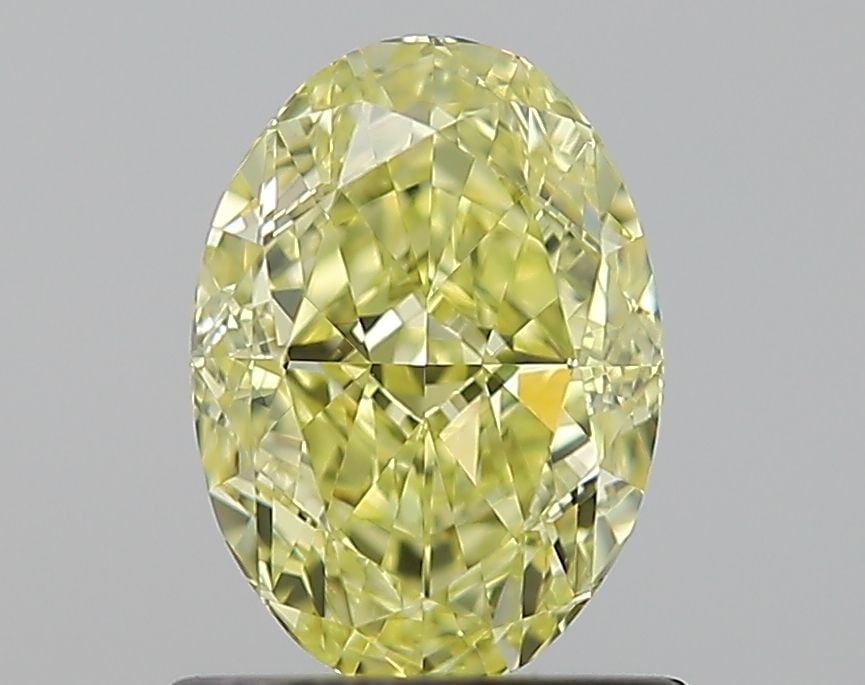 GIA Oval 1.03ct Fancy Intense Yellow VVS1 - Loose Natural Diamond: GIA Oval 1.03ct Fancy Intense Yellow VVS1 - Loose Natural Diamond GIA oval cut, 1.03ct Fancy Intense Yellow VVS1 diamond, with EX polish and VG symmetry, is a stunning natural gem. Measuring 7.34L x