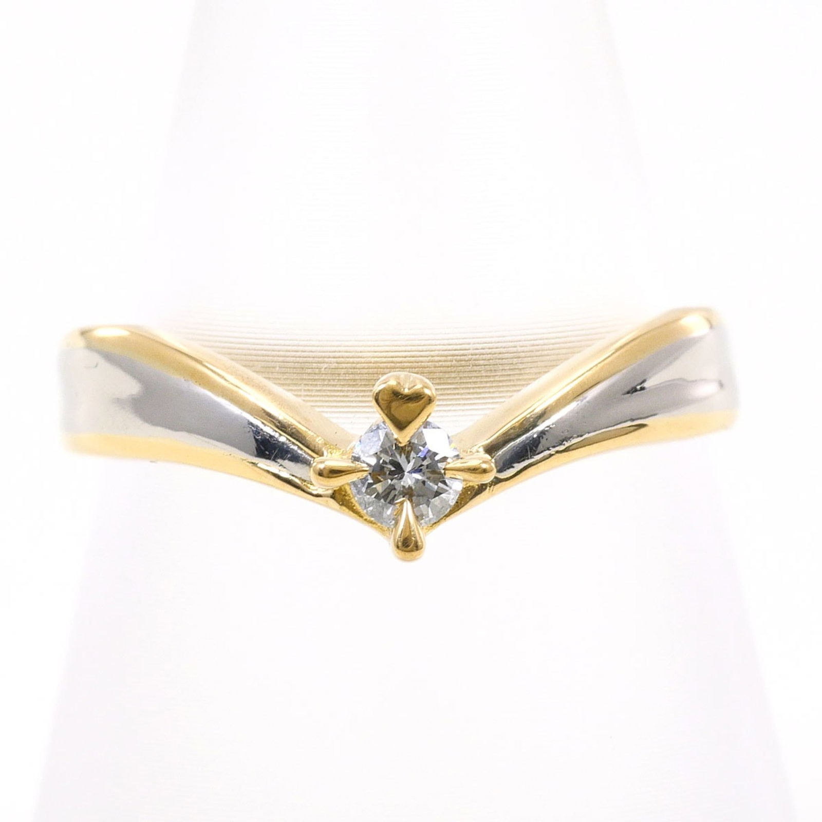 Band Ring Platinum 900 Yellow Gold (18K): Band Ring Platinum 900 Yellow Gold (18K) Platinum 900 Yellow Gold (18K) band ring features a 0.09ct diamond stone set in a high-quality 18K gold and platinum alloy, offering a luxurious touch to any