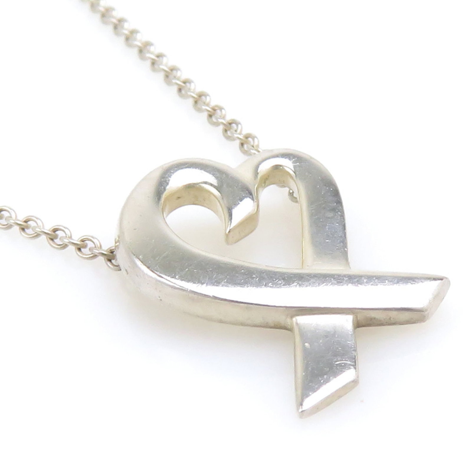 TIFFANY Silver 925: TIFFANY Silver 925 Silver 925 Tiffany Necklace in Good Used Condition. This sterling silver necklace features a 15mm x 10mm pendant with a 42.5 cm / 16.73'' adjustable neck circumference, showcasing