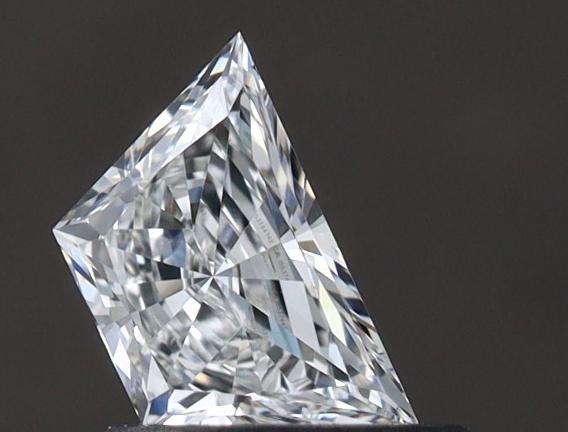 GIA Trapezoid 0.51ct G VVS2 - Loose Natural Diamond: GIA Trapezoid 0.51ct G VVS2 - Loose Natural Diamond GIA certified G VVS2 diamond with exceptional clarity and cut, showcasing a vibrant G color. This 0.51ct trapezoid diamond boasts EX polish and VG