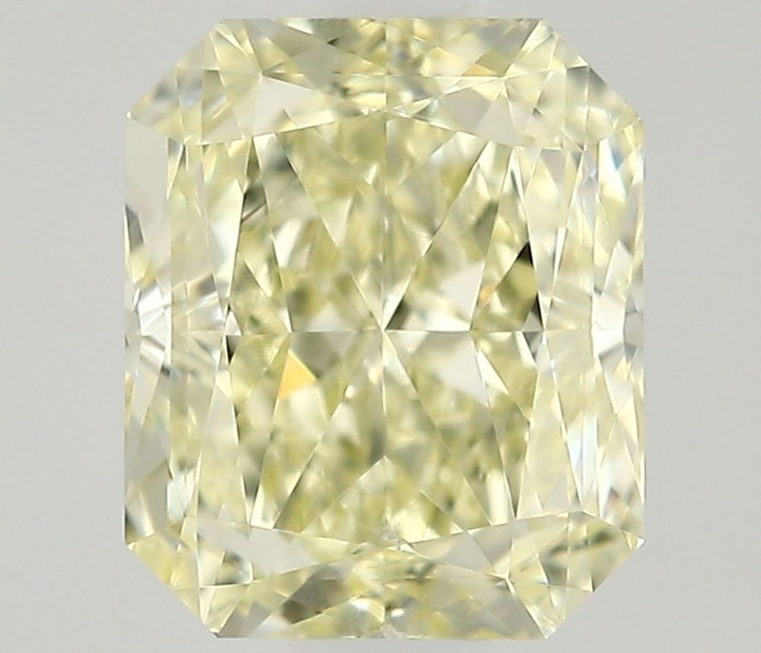 GIA Radiant 0.7ct Fancy Light Yellow VVS2 - Loose Natural Diamond: GIA Radiant 0.7ct Fancy Light Yellow VVS2 - Loose Natural Diamond GIA-certified, this 0.7ct Fancy Light Yellow VVS2 diamond boasts exceptional clarity and a vibrant, sunny hue. Measuring 5.3L x 4.42W