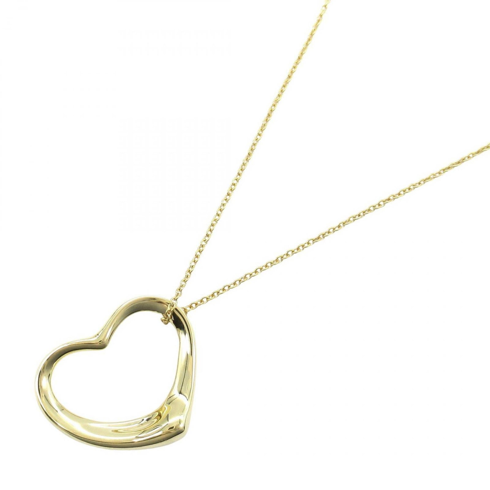 TIFFANY Yellow Gold (18K): TIFFANY Yellow Gold (18K) Yellow gold (18K) necklace from Tiffany, featuring a 18mm x 21mm pendant. Gently used with minor signs of wear, this necklace is in very good condition, with small scratches