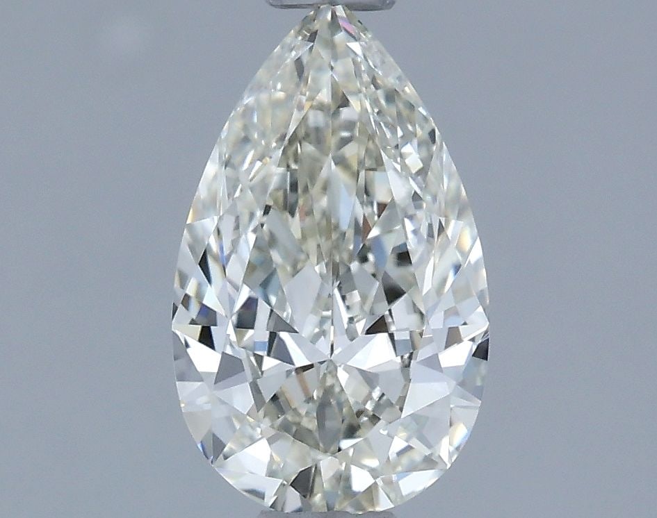 IGI Pear 0.94ct J VVS1 - Loose Natural Diamond: IGI Pear 0.94ct J VVS1 - Loose Natural Diamond 0.94ct IGI VVS1 J Pear Diamond - Natural BeautyThe IGI certified 0.94ct pear diamond boasts exceptional clarity, with a VVS1 grade indicating minimal
