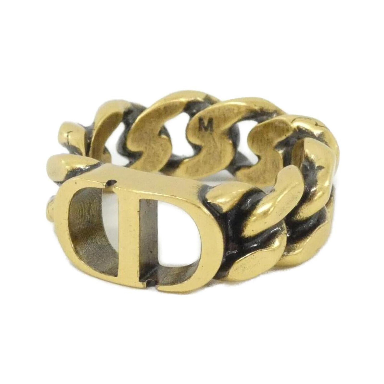 CHRISTIAN DIOR Band Ring: CHRISTIAN DIOR Band Ring The Christian Dior Band Ring boasts a sleek, modern design that exudes sophistication. This gently used band ring features minor signs of wear, including small scratches or li