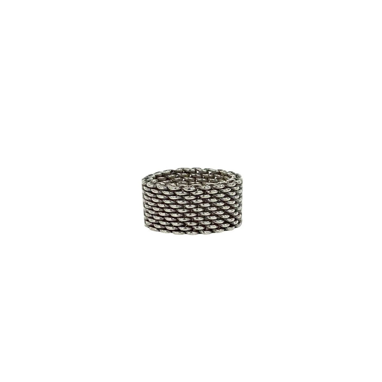 TIFFANY Band Ring Silver 925: TIFFANY Band Ring Silver 925 Silver 925 band ring from Tiffany, a classic design with a subtle elegance, bears visible scratches and scuffs from everyday wear, adding to its character. Made from high-