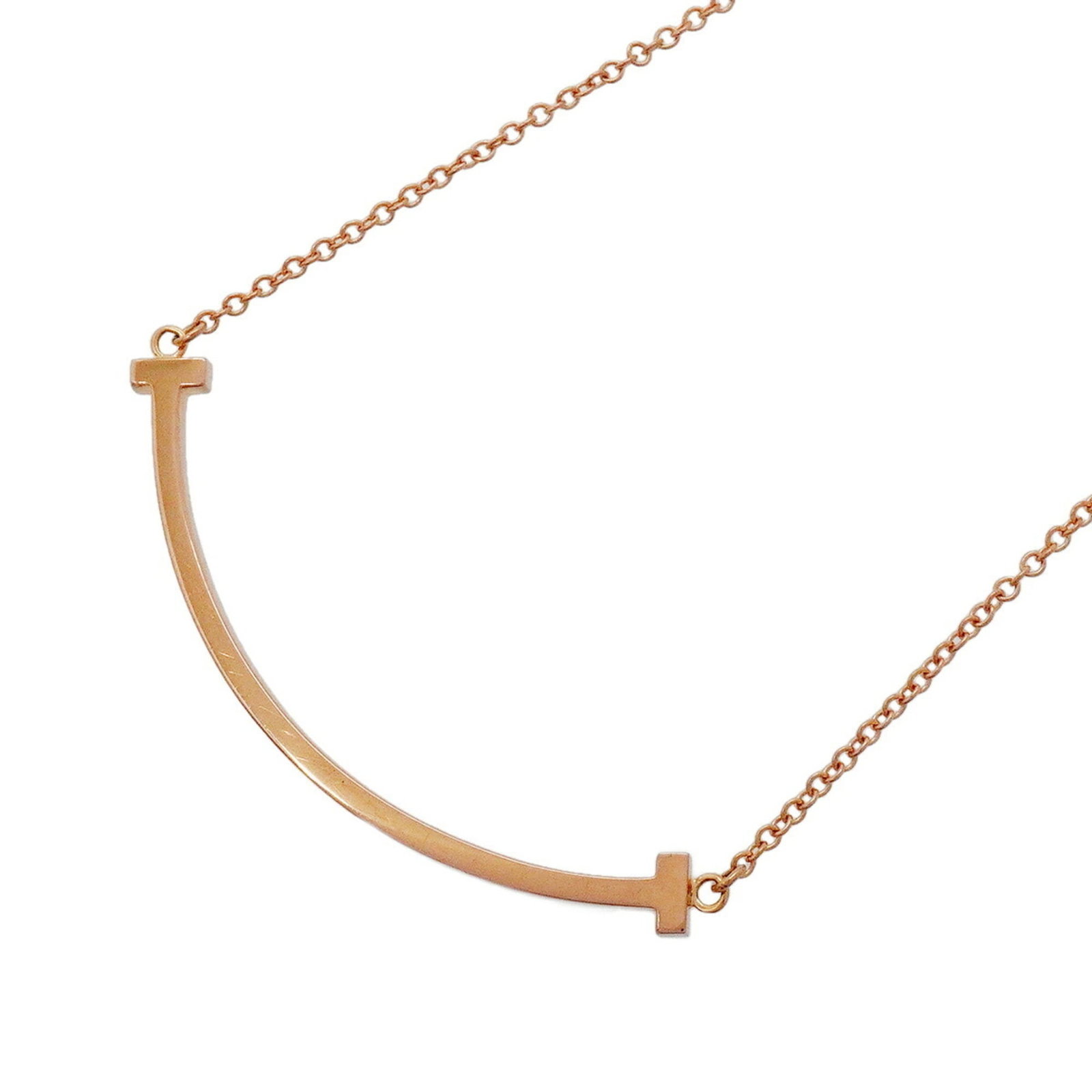 TIFFANY Pink Gold (18K): TIFFANY Pink Gold (18K) Pink gold (18K) necklace with a 10.1mm x 37.7mm pendant, available in a 40.5 cm - 45.5 cm circumference. The necklace bears visible scratches, scuffs, and dirt, but remains ful