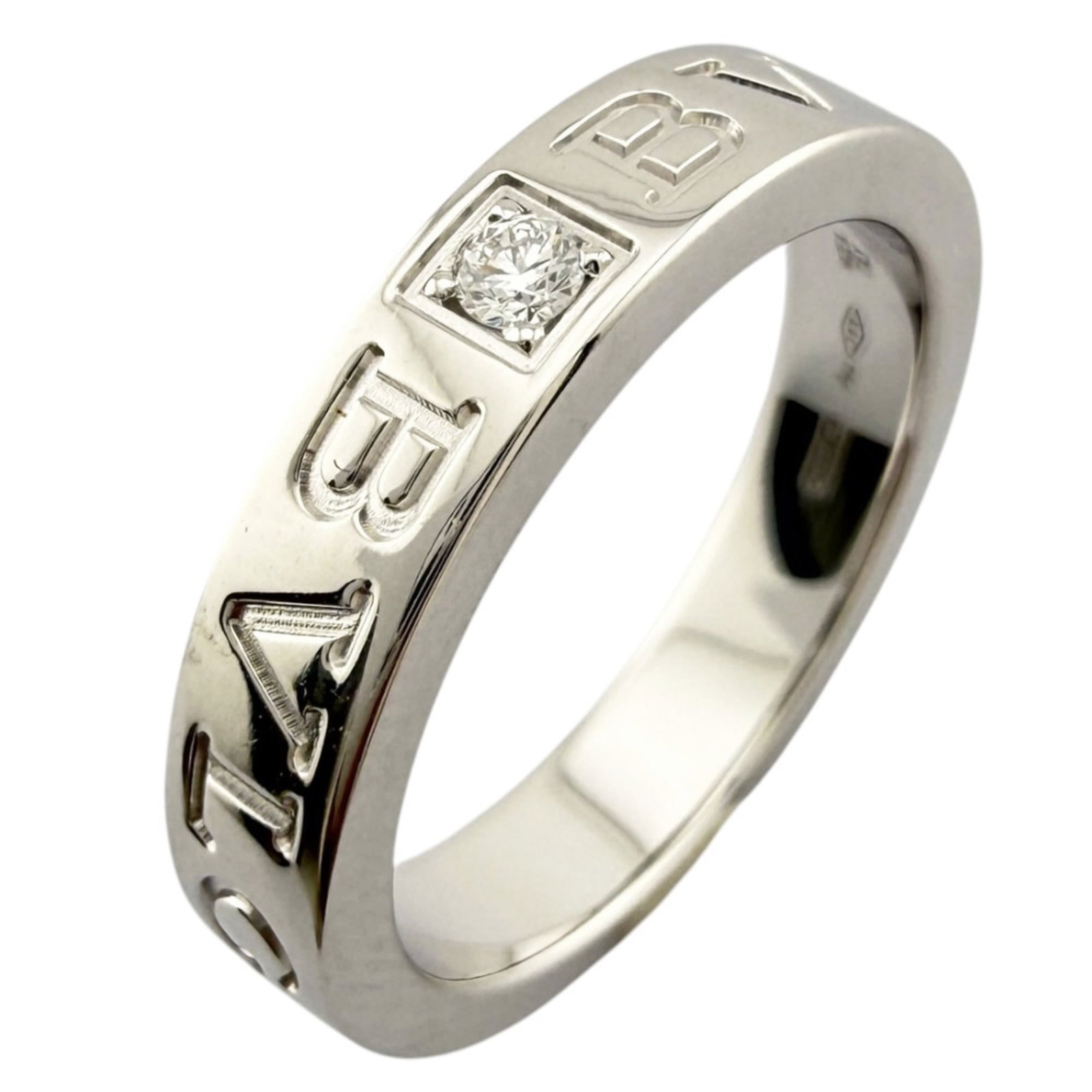 BVLGARI Band Ring White Gold (18K): BVLGARI Band Ring White Gold (18K) BVLGARI Band Ring White Gold (18K) is a stunning women's band ring crafted from 18K white gold. This elegant piece features a diamond stone and boasts a sleek, moder