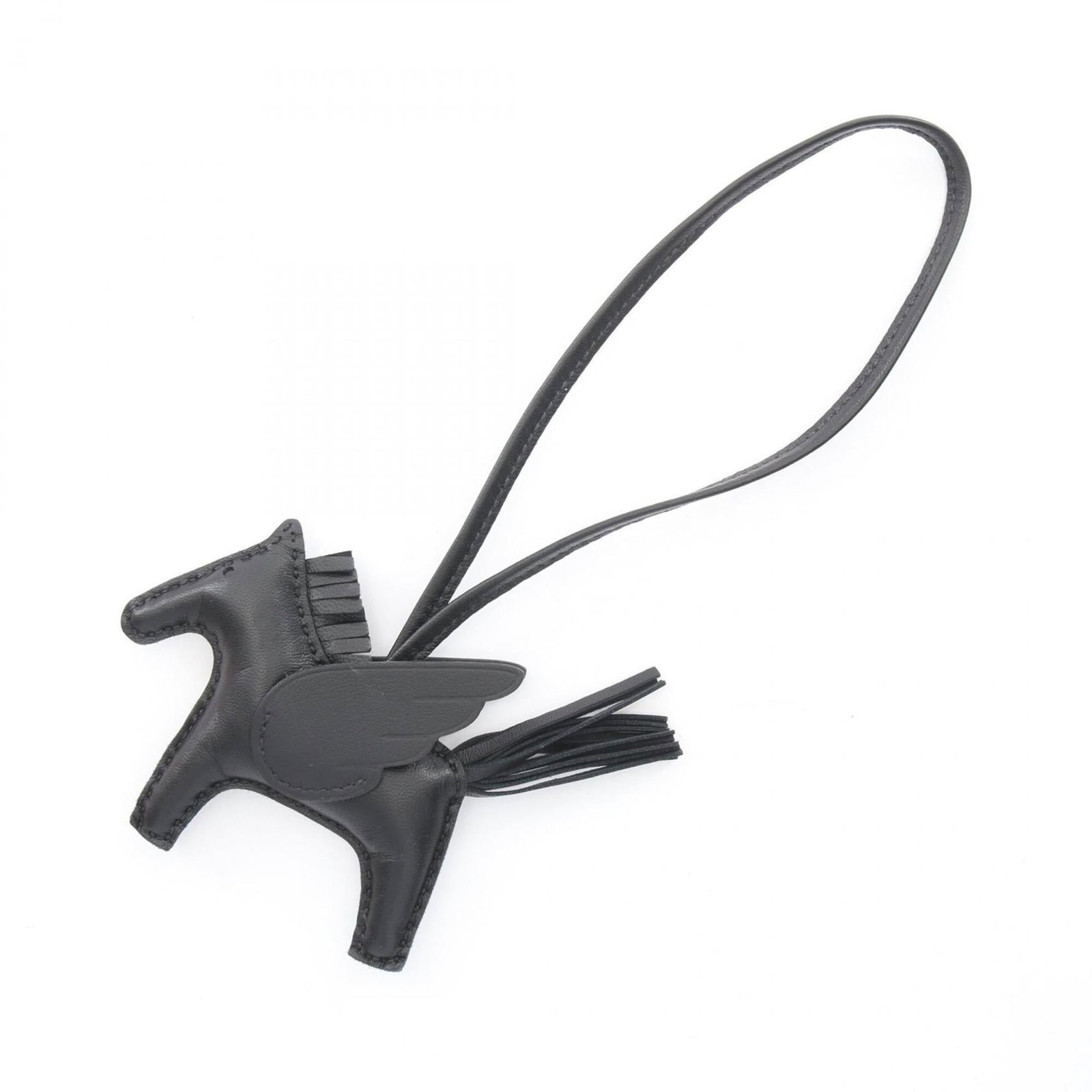 HERMES Handbag Charm Black: HERMES Handbag Charm Black Black Hermes Handbag Charm, gently used with minor signs of wear, bears a signature. Small scratches or light marks may be present, but the item is overall in very good