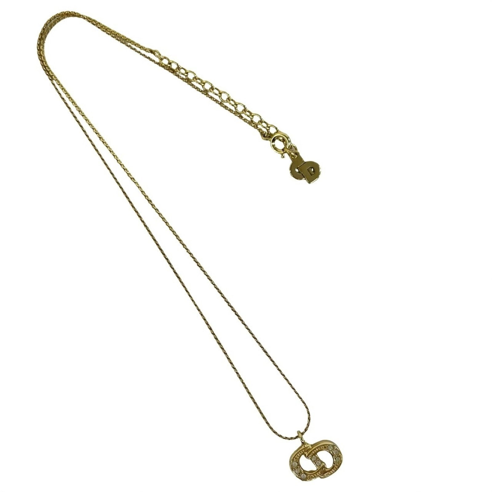 CHRISTIAN DIOR Gold Plating: CHRISTIAN DIOR Gold Plating Gold Plating from Christian Dior, a statement necklace featuring a 10mm x 13mm pendant with a gold plating finish, measures 44 cm in circumference. The piece bears visible 