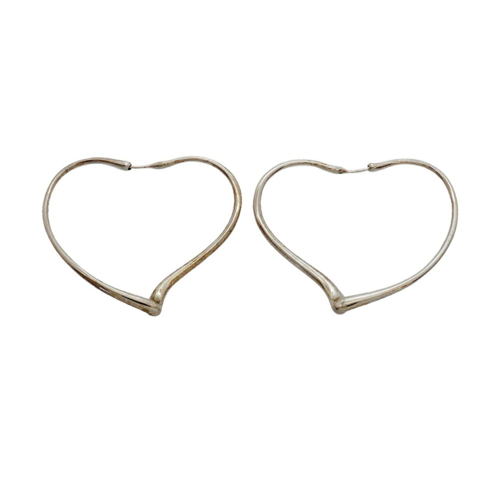 TIFFANY Stud Earrings Silver 925: TIFFANY Stud Earrings Silver 925 Stud earrings with a silver 925 finish, bearing a Tiffany signature, are available. The earrings feature a 41.10mm x 2.40mm design with visible scratches and scuffs. T