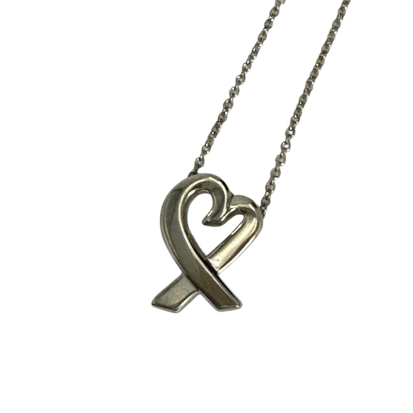 TIFFANY Silver Pendant Necklace: TIFFANY Silver Pendant Necklace Silver Tiffany Loving Heart Necklace Pendant. This elegant pendant features a 15mm x 13mm silver design, suspended from a 41cm chain. The necklace comes with a box and