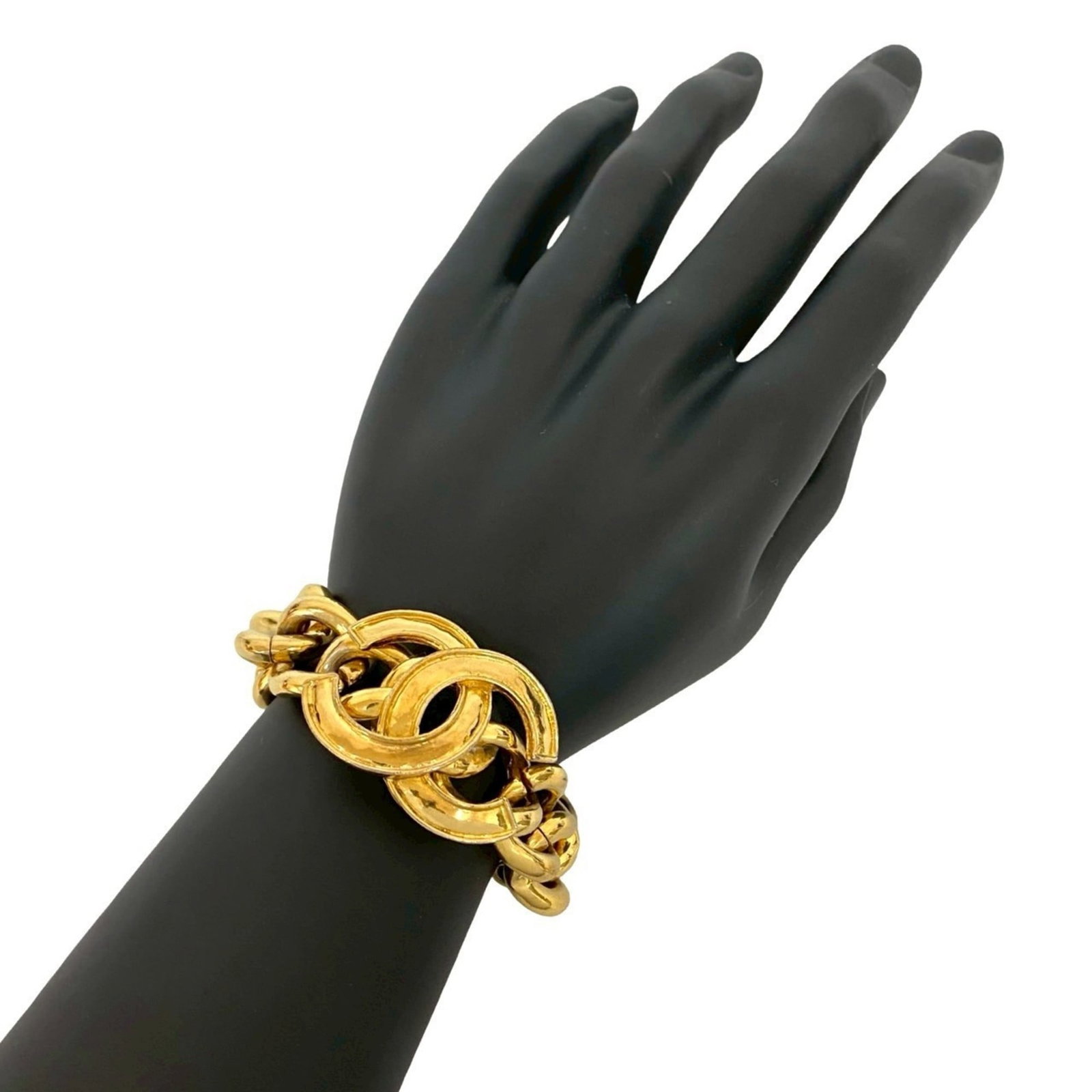 CHANEL Charm Bracelet Gold Plating: CHANEL Charm Bracelet Gold Plating Gold plating on a classic CHANEL charm bracelet, available in a 20.5cm length. This pre-owned piece features visible wear, scratches, and scuffs, but remains fully