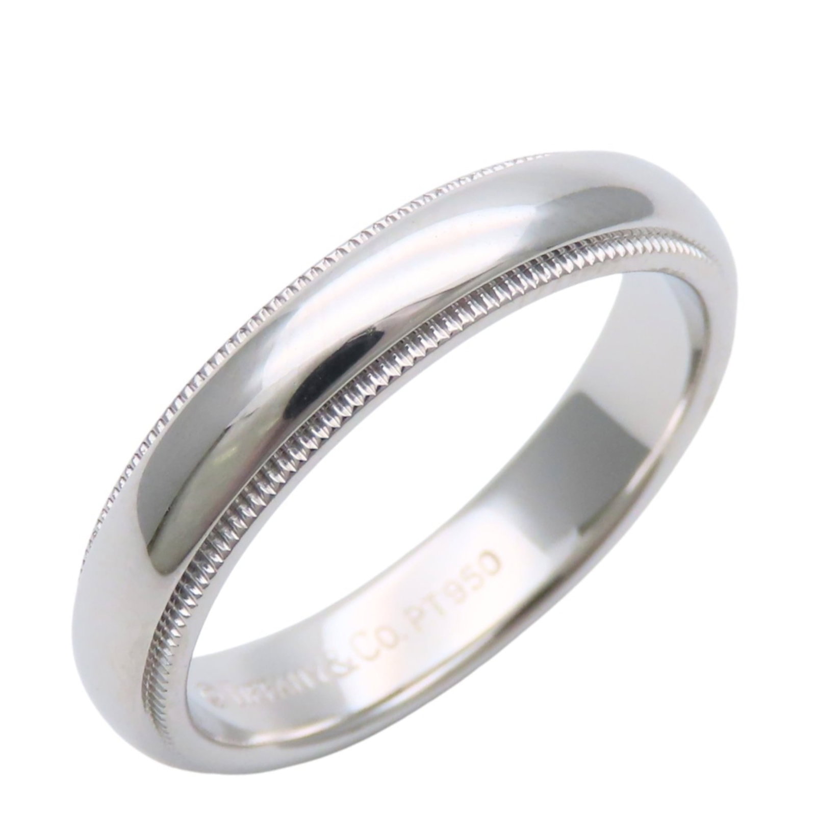 TIFFANY Band Ring Platinum 950: TIFFANY Band Ring Platinum 950 Platinum 950 band ring from Tiffany, a symbol of timeless elegance. Made from high-quality platinum, this ring boasts a sleek and sophisticated design. In like new