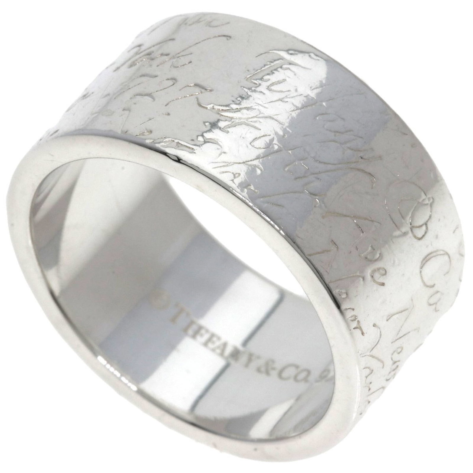TIFFANY Band Ring Silver: TIFFANY Band Ring Silver Silver band ring from Tiffany, a classic design with a sleek and modern look. This like new used ring features a subtle shine and is in excellent condition, with only the