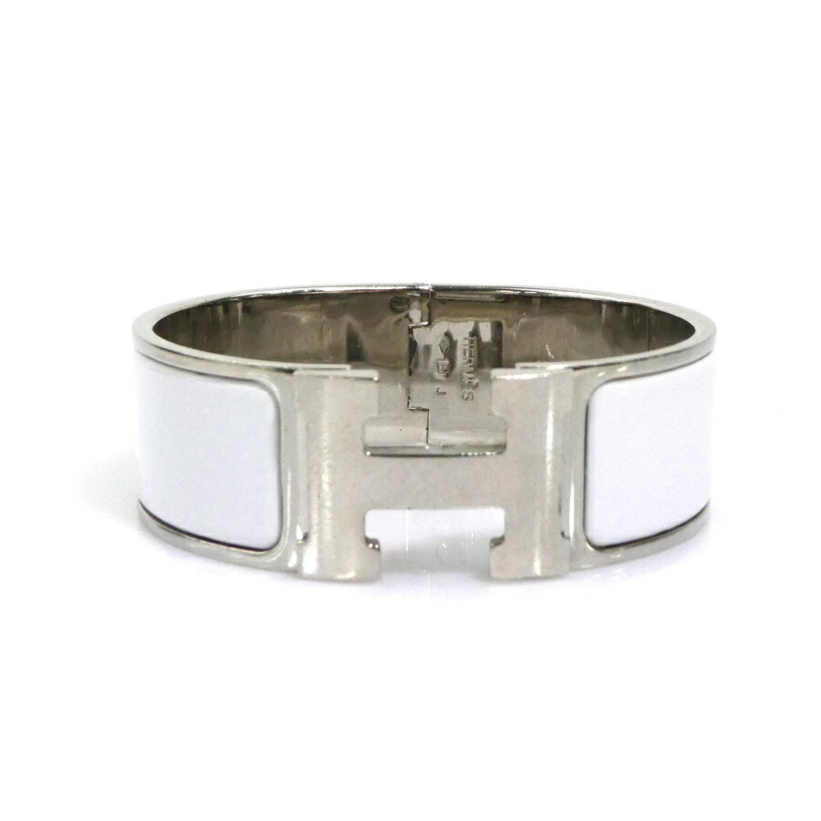 HERMES Bangle Enamel Metal: HERMES Bangle Enamel Metal Silver and white enamel metal bangle from Hermes, featuring a classic design with visible wear and scratches. The bangle measures 16cm in length and is made from a