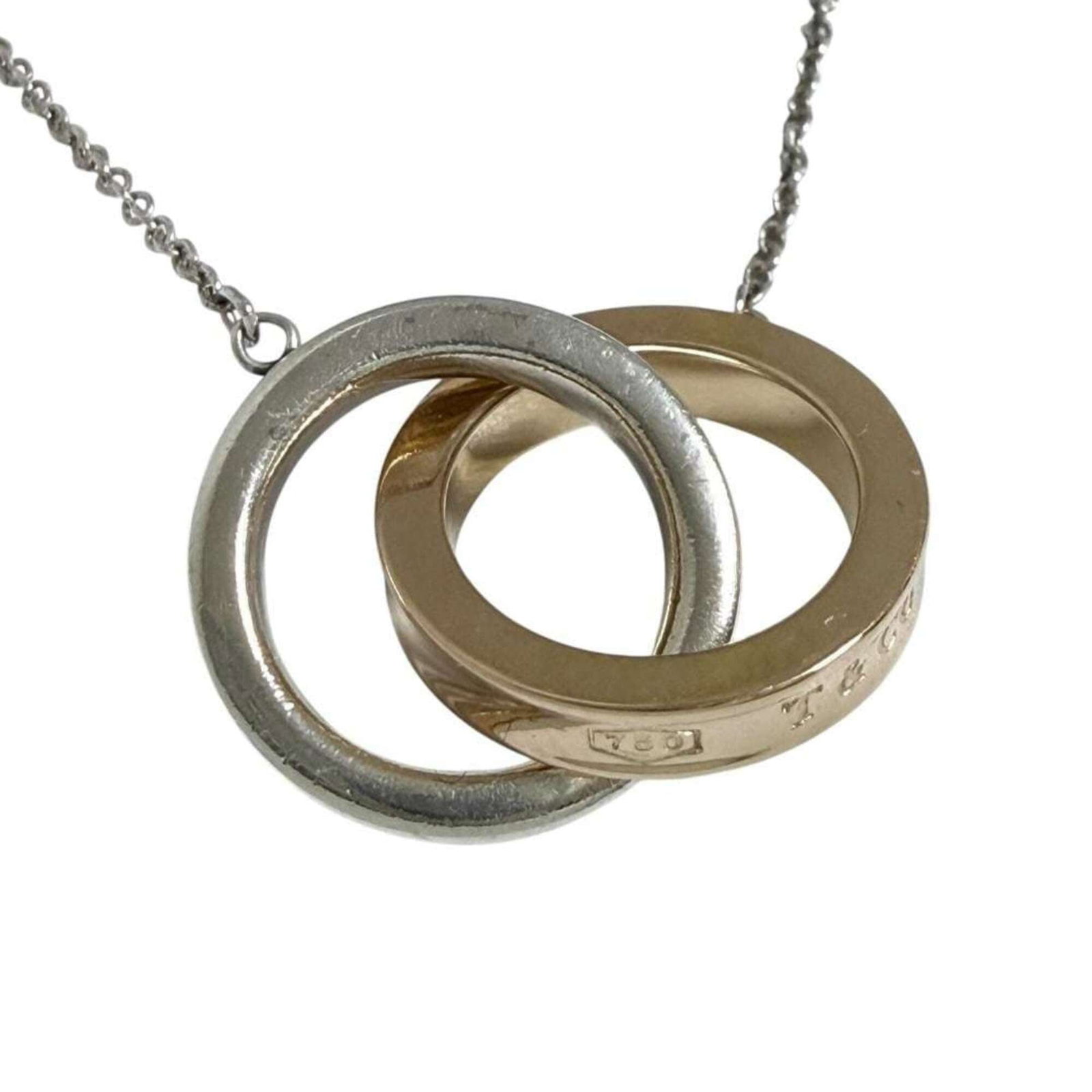TIFFANY Pink Gold (18K) Silver 925: TIFFANY Pink Gold (18K) Silver 925 Pink gold (18K) and silver 925 come together in this elegant Tiffany necklace, featuring a pendant that shines in gold and silver hues. The 40 cm necklace