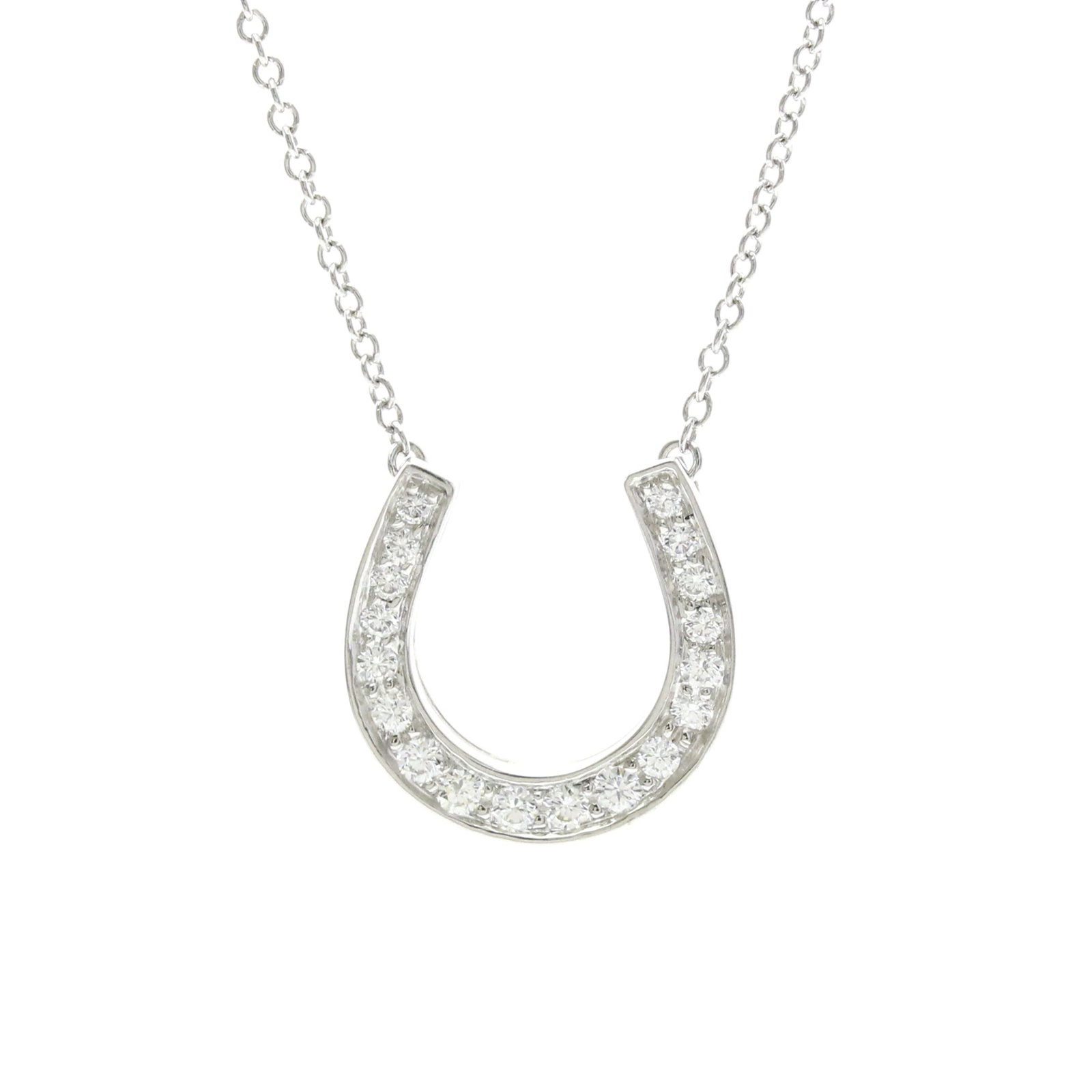 TIFFANY Platinum Silver: TIFFANY Platinum Silver Tiffany's Platinum Silver Horseshoe Diamond Necklace is a stunning fashion piece featuring a 3.4g diamond pendant suspended from a 40 cm chain. The necklace boasts a sleek silv