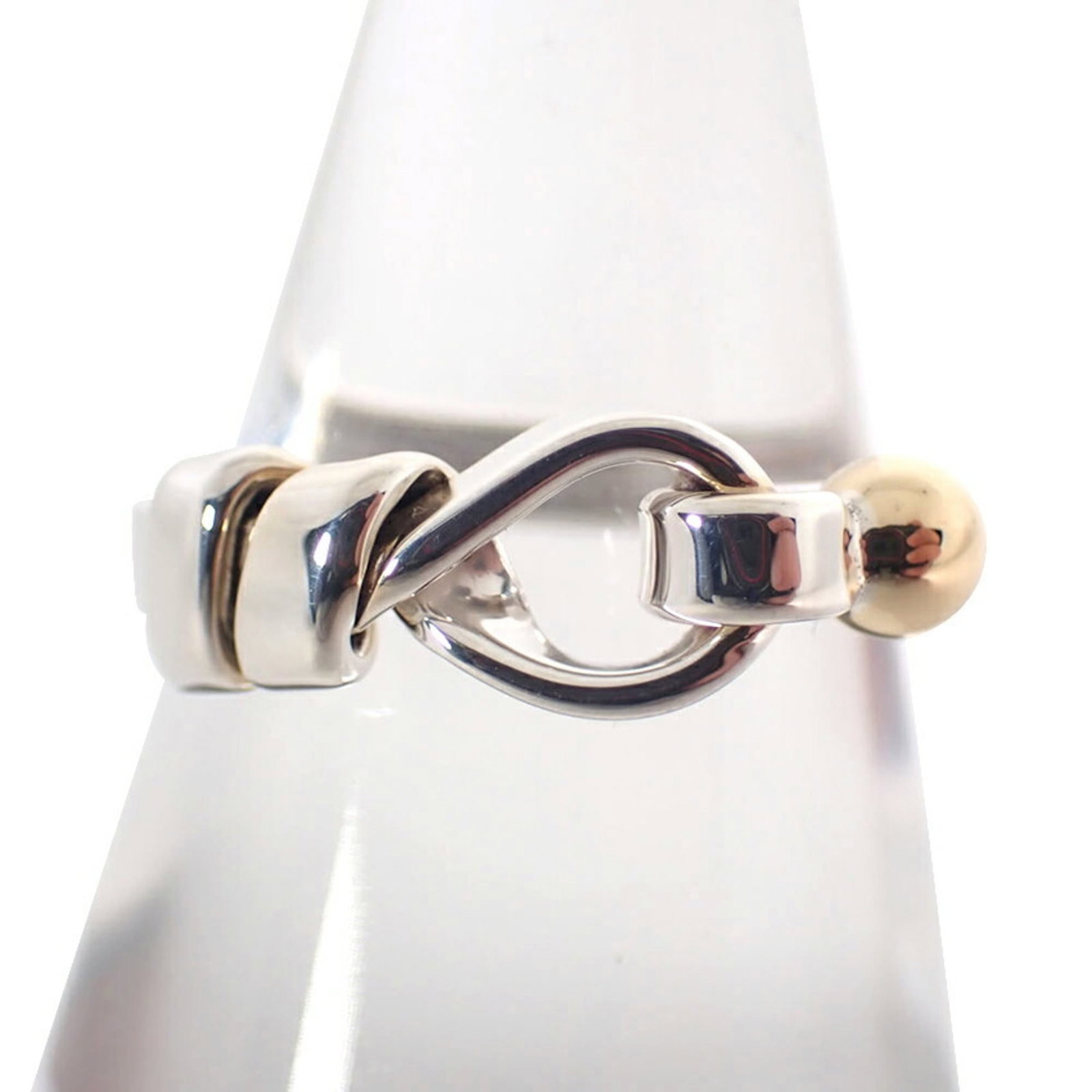 TIFFANY Band Ring Sterling Silver 925 Yellow Gold (18K): TIFFANY Band Ring Sterling Silver 925 Yellow Gold (18K) Sterling silver 925 and 18K yellow gold band ring from Tiffany, featuring a classic design. This gently used ring shows minor signs of wear, wit