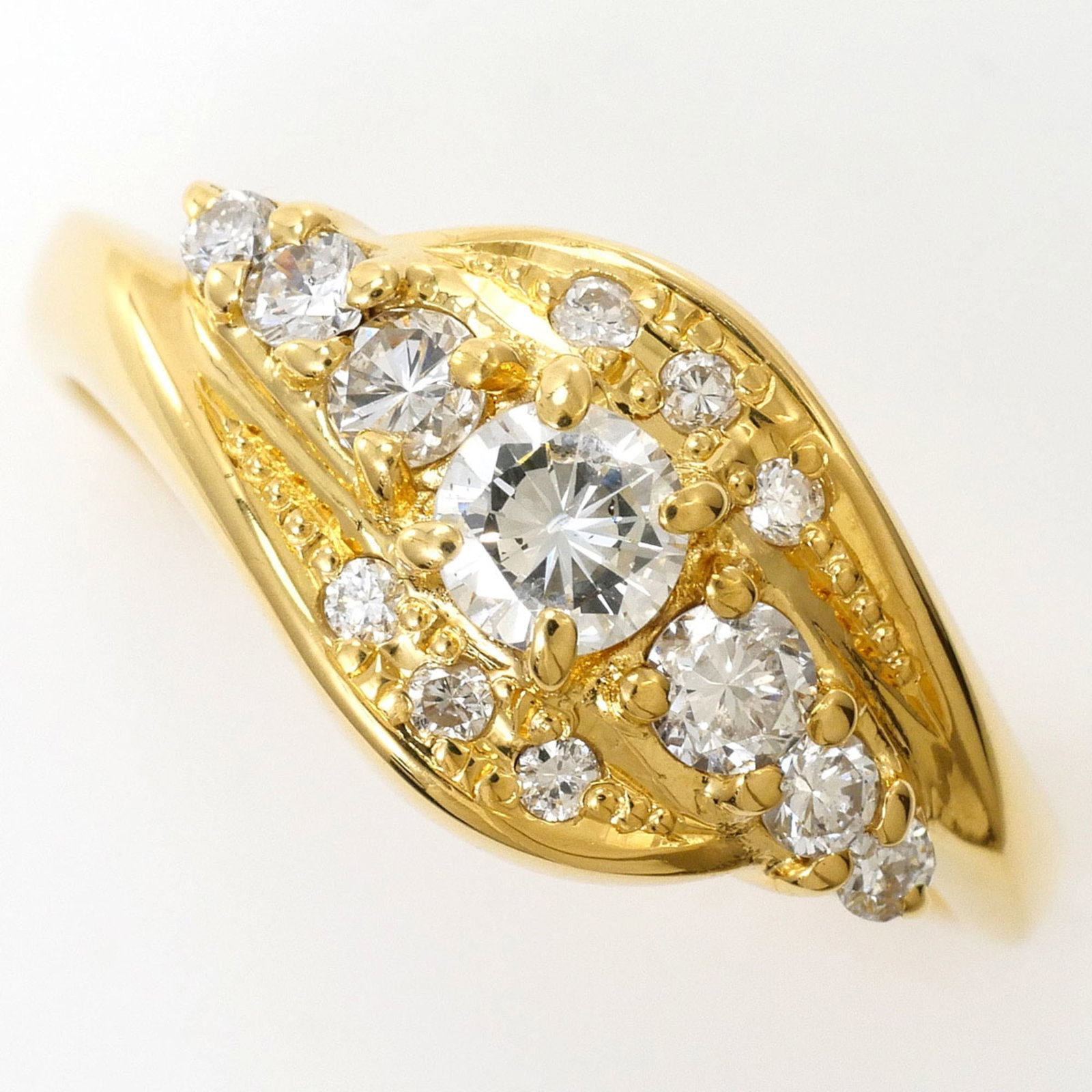 Band Ring Yellow Gold (18K): Band Ring Yellow Gold (18K) Yellow gold band ring with a 9mm diamond stone, crafted from 18K metal, offering a touch of elegance and sophistication. This 5 US size ring is made from high-quality yello