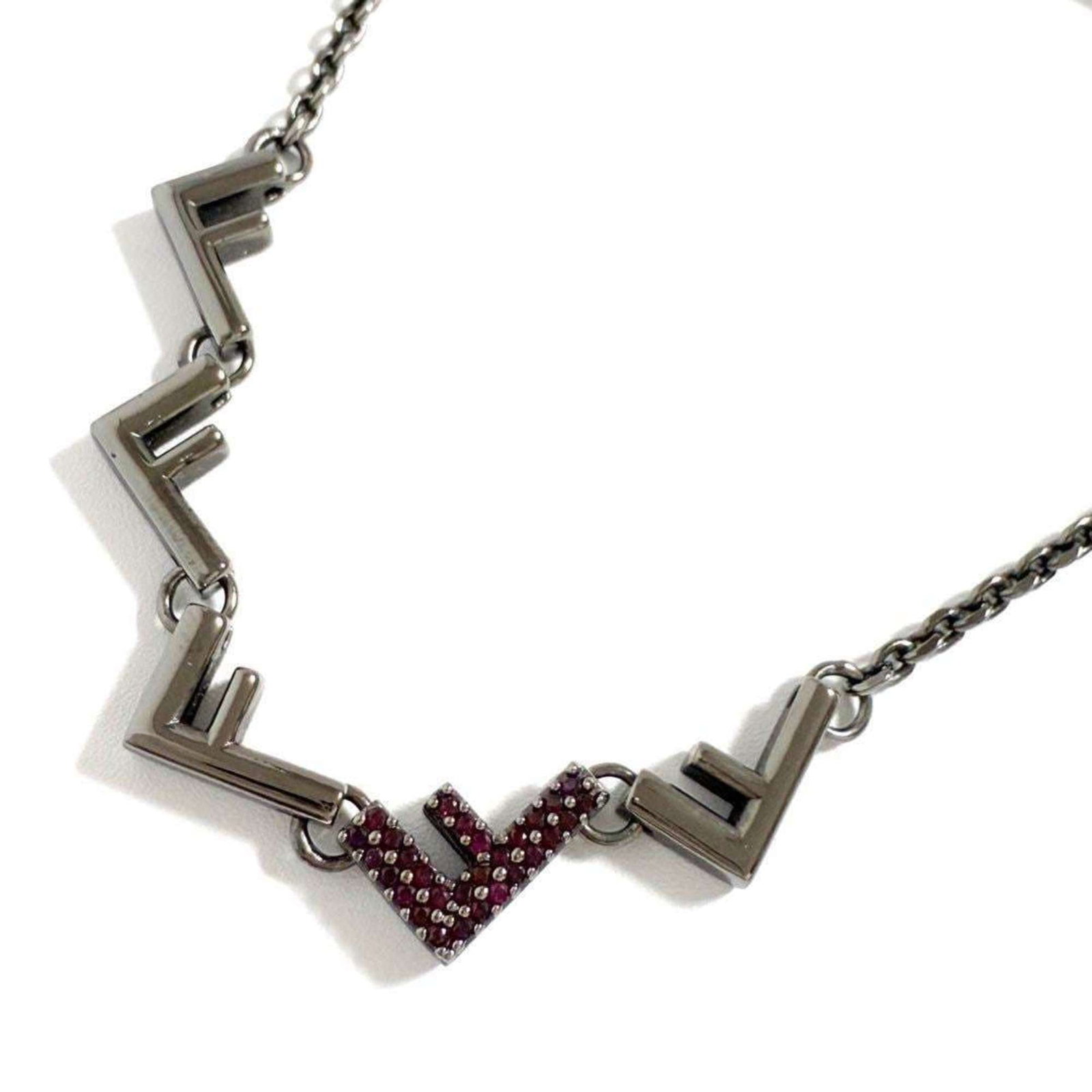 FENDI Metal Rhinestone: FENDI Metal Rhinestone Metal pendant adorned with rhinestones from Fendi, available in a range of sizes to fit 43-50 cm necks. This necklace comes in its original box, in like new condition with only 
