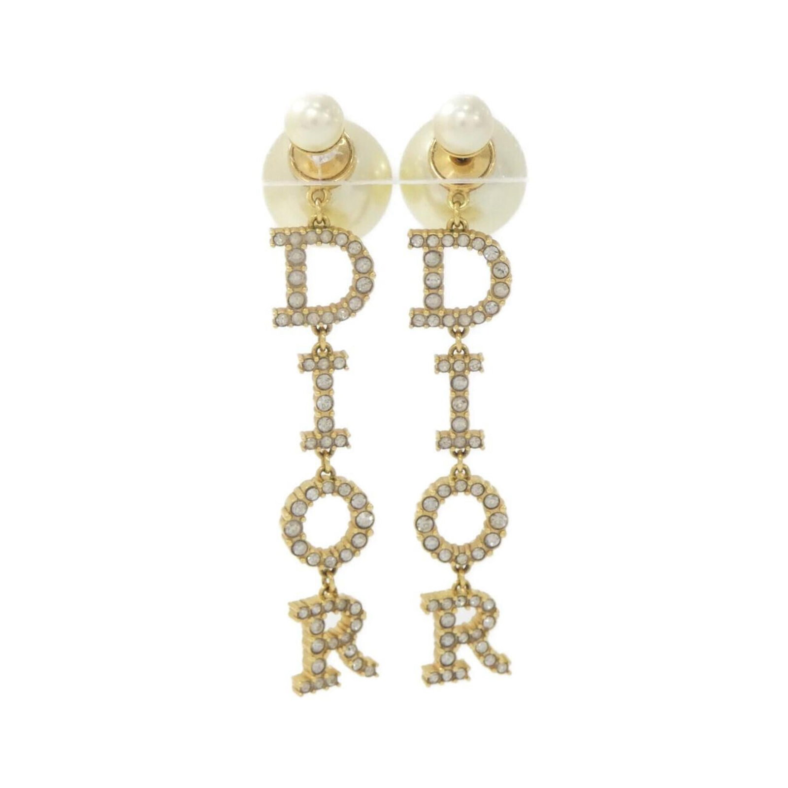 CHRISTIAN DIOR Stud Earrings Clear Gold White: CHRISTIAN DIOR Stud Earrings Clear Gold White Clear gold and white stud earrings from Christian Dior, featuring a minimalist design that adds a touch of elegance to any outfit. With a subtle shine and