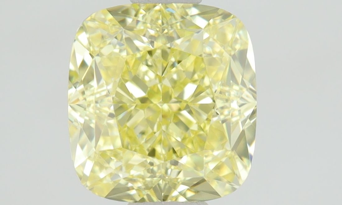 GIA Cushion Brilliant 1.01ct Fancy Yellow VVS2 - Loose Natural Diamond: GIA Cushion Brilliant 1.01ct Fancy Yellow VVS2 - Loose Natural Diamond GIA certified, this 1.01ct Fancy Yellow VVS2 diamond boasts an EX polish and VG symmetry, making it a standout among its peers. T