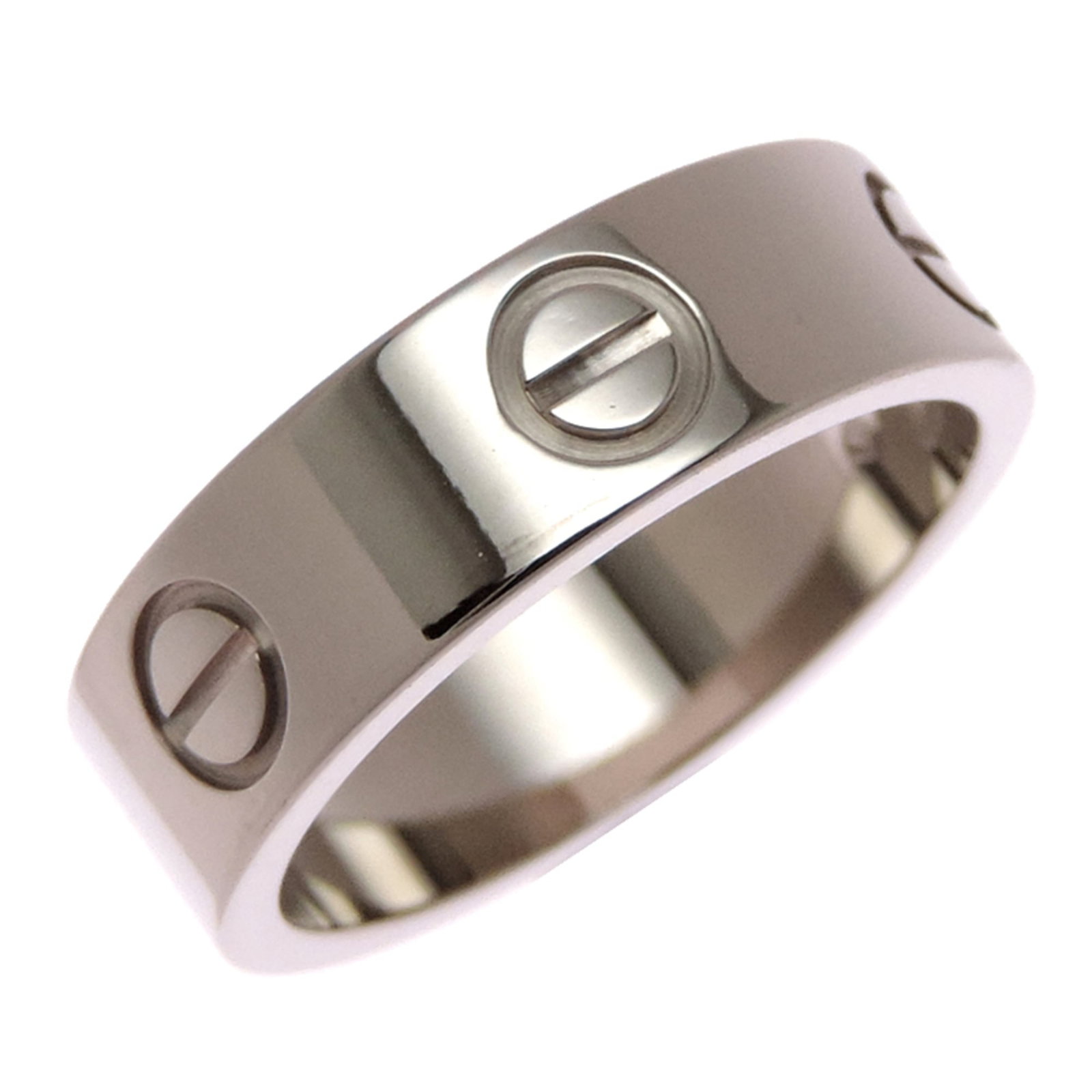 CARTIER Band Ring White Gold (18K): CARTIER Band Ring White Gold (18K) Cartier Band Ring White Gold (18K) is a classic women's band ring featuring 18K white gold. With visible scratches, scuffs, and dirt, this item has been worn and sho