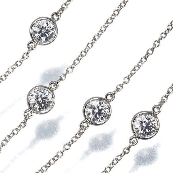 Tiffany&Co. Necklace Diamond 5P Station Pt 950: Tiffany&Co. Necklace Diamond 5P Station Pt 950 Tiffany & Co.'s Station Collection necklace showcases a stunning 1ct diamond, expertly set in platinum. The necklace's 42cm length and 4.8mm design width