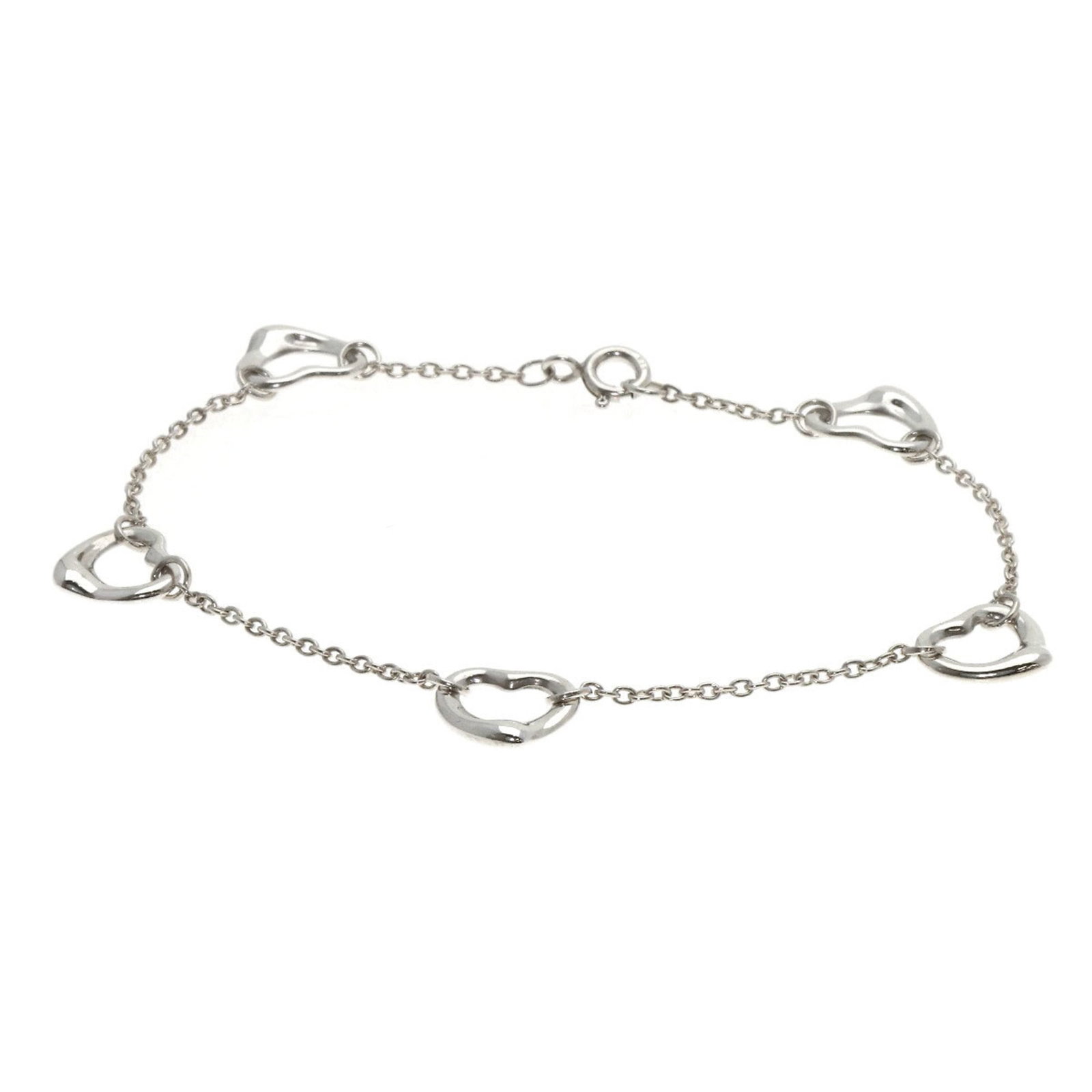 TIFFANY Charm Bracelet Silver: TIFFANY Charm Bracelet Silver Silver charm bracelet from Tiffany, featuring an open heart design, measures 19cm in length and 1.3mm in width, and weighs 4.2g. The bracelet is made of silver and has
