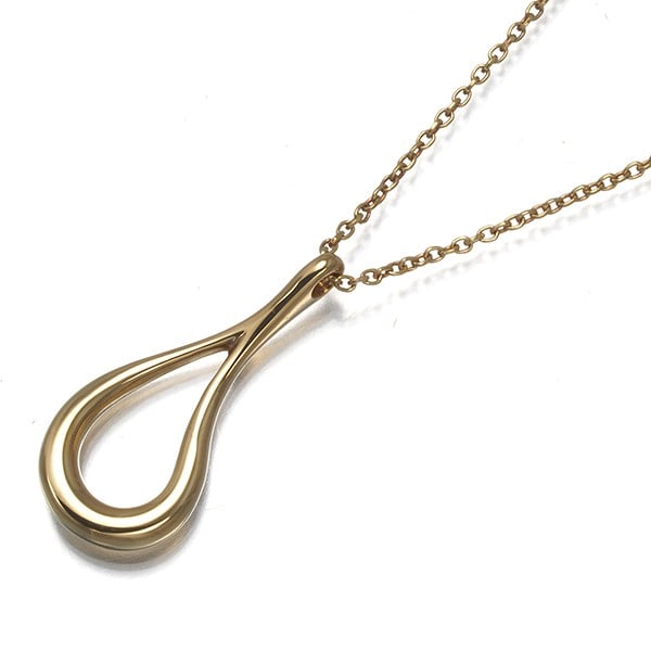 Tiffany&Co. Necklace Open Teardrop 18K 750 Yellow Gold: Tiffany&Co. Necklace Open Teardrop 18K 750 Yellow Gold Tiffany & Co.'s Open Teardrop necklace is a stunning 18k yellow gold piece, featuring a signature design by Elsa Peretti. This elegant pendant is