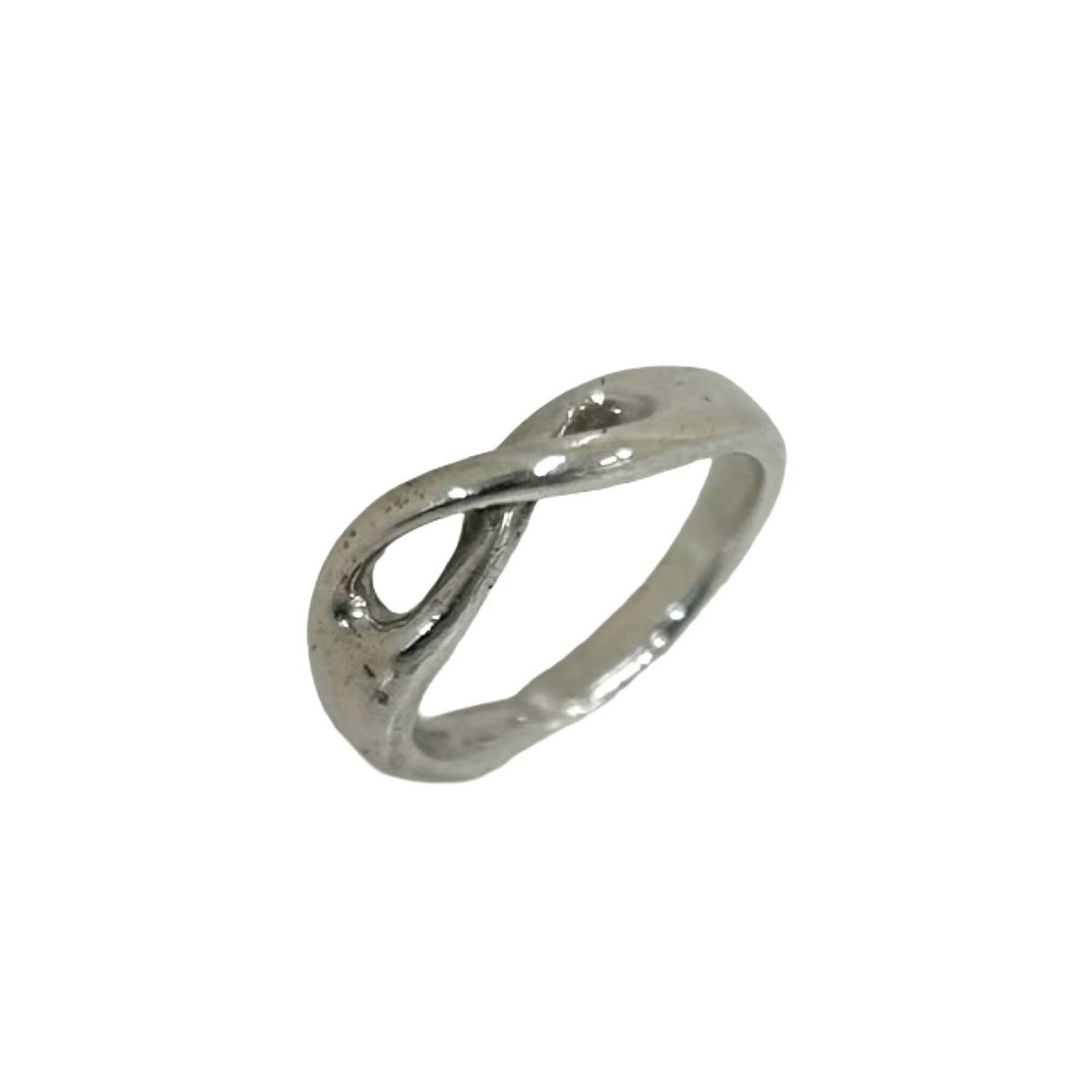 TIFFANY Band Ring Silver 925: TIFFANY Band Ring Silver 925 Silver 925 band ring from Tiffany features a sleek, modern design. The ring bears visible signs of wear, including scratches and scuffs, but remains fully functional. Sold