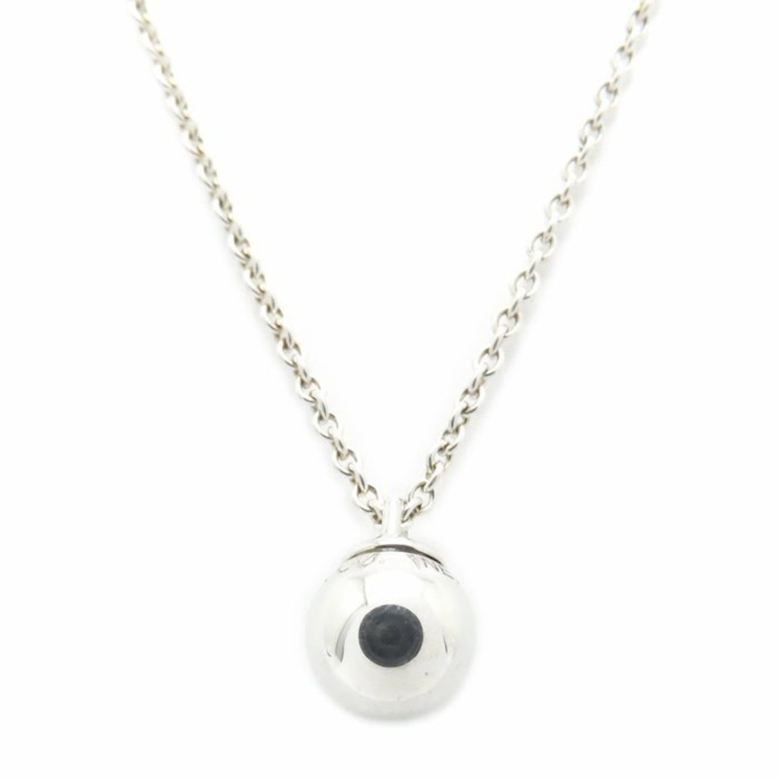TIFFANY Silver 925: TIFFANY Silver 925 Silver 925 Tiffany necklace with a delicate 7.6mm diameter pendant, suitable for a 40.5 cm - 46 cm neck circumference, bearing a minor scratch. Gently used in very good condition,