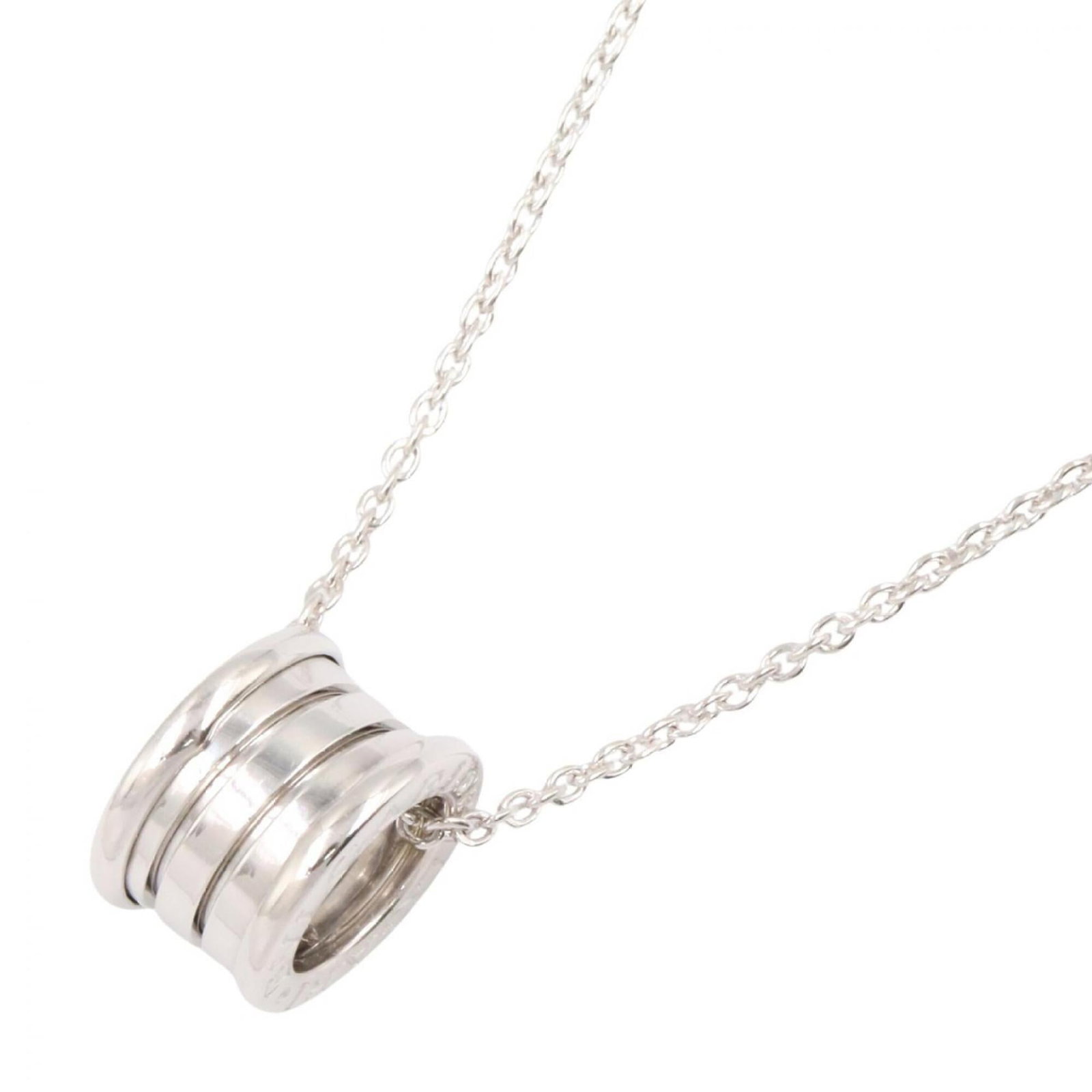 BVLGARI White Gold (18K): BVLGARI White Gold (18K) BVLGARI White Gold (18K) Necklace features a 14mm x 9mm pendant suspended from a 41.5 cm / 16.33'' chain, crafted from 18K white gold. This necklace is in like new condition,