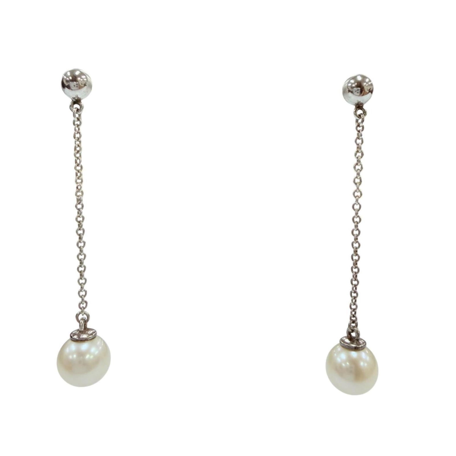 TIFFANY Stud Earrings Silver 925: TIFFANY Stud Earrings Silver 925 Silver 925 stud earrings from Tiffany, featuring a classic design with a subtle touch of elegance. Gently used with minor signs of wear, these earrings showcase a