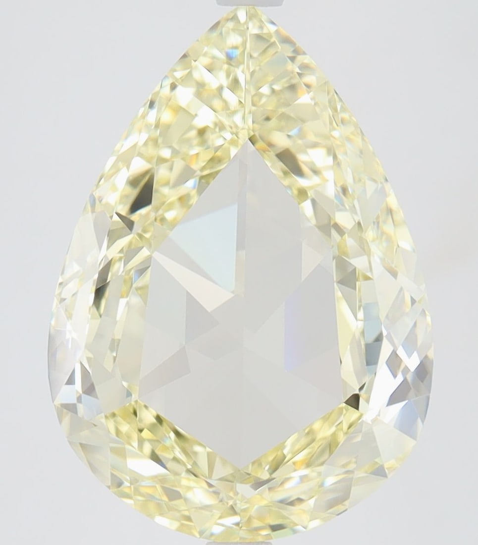 GIA Pear 5.01ct Fancy Yellow VVS2 - Loose Natural Diamond: GIA Pear 5.01ct Fancy Yellow VVS2 - Loose Natural Diamond 5.01ct Fancy Yellow VVS2 - Loose Natural Diamond with Excellent Polish and Symmetry. This GIA-certified Fancy Yellow diamond boasts a vibrant 