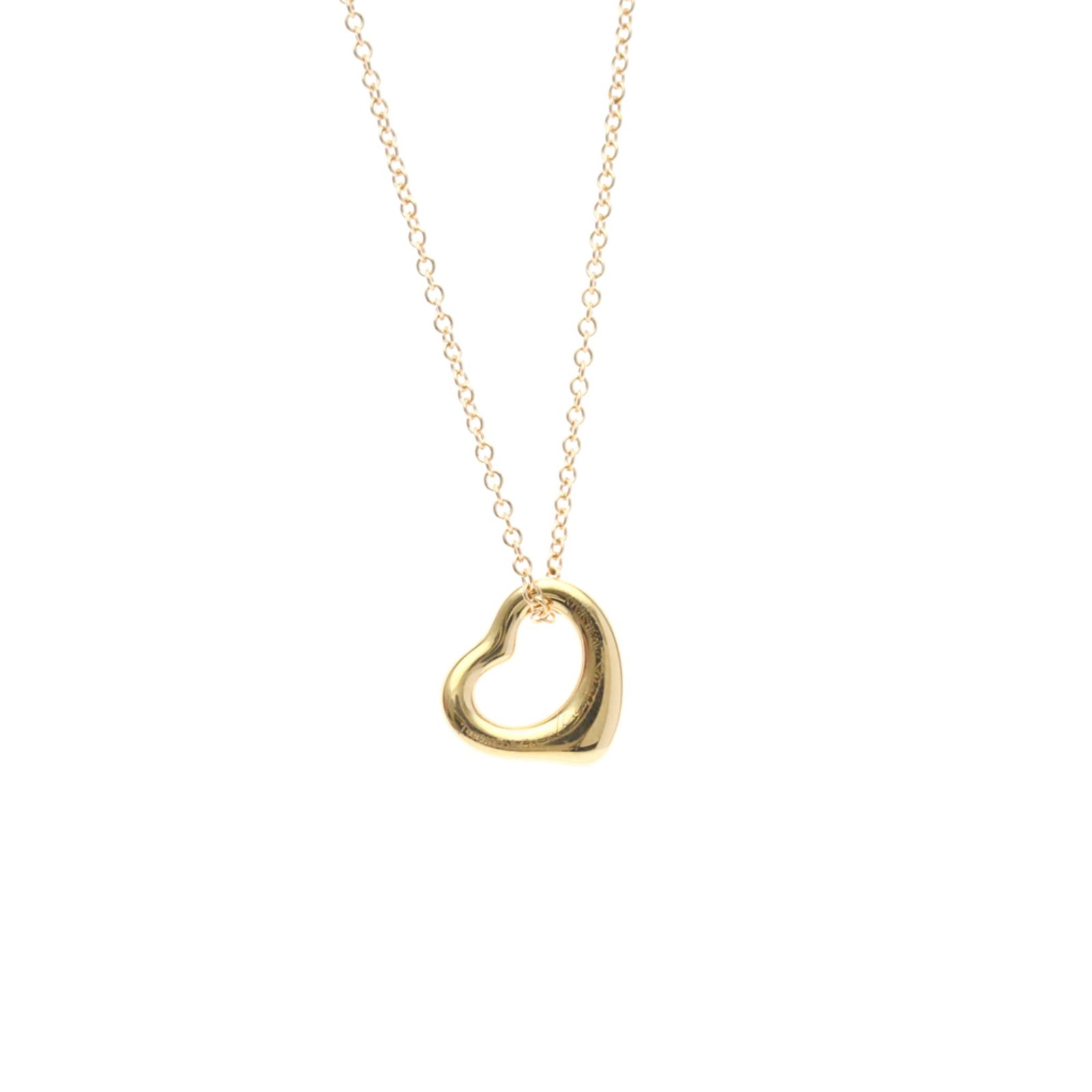 TIFFANY Pink Gold (18K): TIFFANY Pink Gold (18K) Pink gold (18K) pendant necklace from Tiffany, featuring a 11mm x 11mm open heart design. This gently used necklace showcases a subtle pink gold hue and weighs 2.9g. Minor