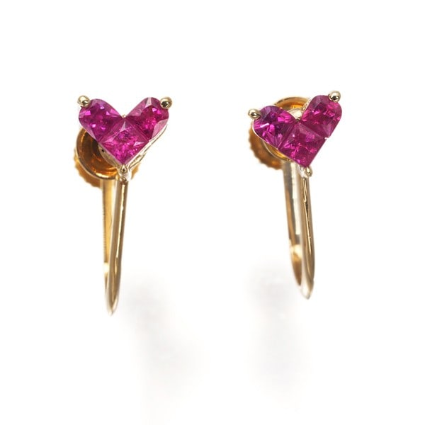 Ruby 0.20Ct/0.20Ct Heart Earrings 18K 750 Yellow Gold: Ruby 0.20Ct/0.20Ct Heart Earrings 18K 750 Yellow Gold The 18K yellow gold heart earrings showcase two natural rubies, each weighing 0.20ct, suspended from a delicate clip-on design. The 4.7 x 5.2mm