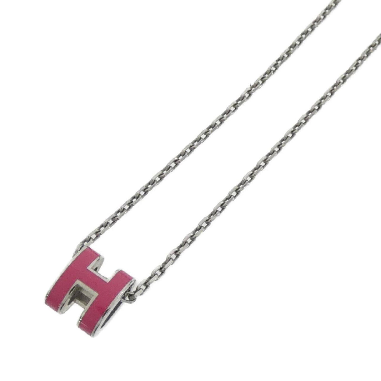 HERMES Palladium Pink Silver: HERMES Palladium Pink Silver Palladium Pink Silver necklace from Hermes, featuring a 9mm x 7mm pendant in a delicate design. This gently used necklace has a 40 cm neck circumference and is made from