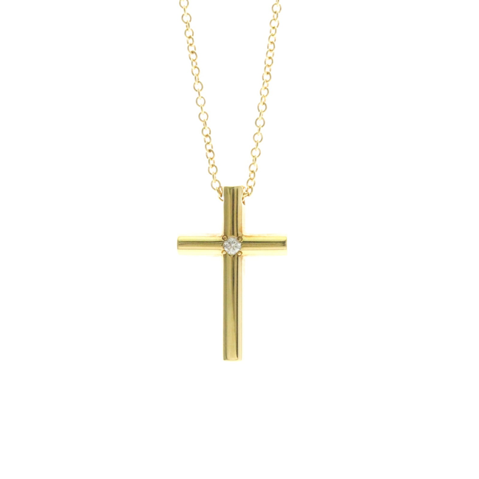 TIFFANY Yellow Gold (18K): TIFFANY Yellow Gold (18K) Yellow gold (18K) Tiffany cross diamond pendant necklace, featuring a 3.6g diamond, 41cm chain, and 17.8mm x 11.5mm pendant, gently used with minor signs of wear. This