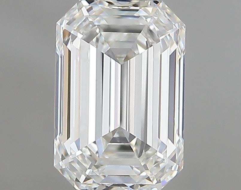 HRD Emerald 0.9ct F VVS2 - Loose Natural Diamond: HRD Emerald 0.9ct F VVS2 - Loose Natural Diamond 0.9ct F VVS2 Emerald Cut Diamond with EX Polish and Symmetry, Certified by HRD. This natural diamond boasts exceptional clarity and a vibrant color,