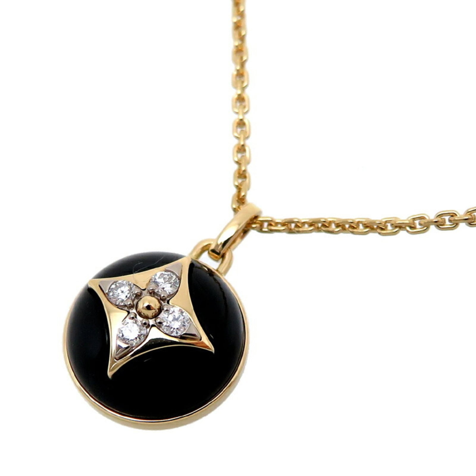 LOUIS VUITTON Yellow Gold: LOUIS VUITTON Yellow Gold Yellow gold necklace from Louis Vuitton, featuring onyx and white stones with a diamond accent, set in a 7g pendant. The necklace has a 41cm circumference and measures