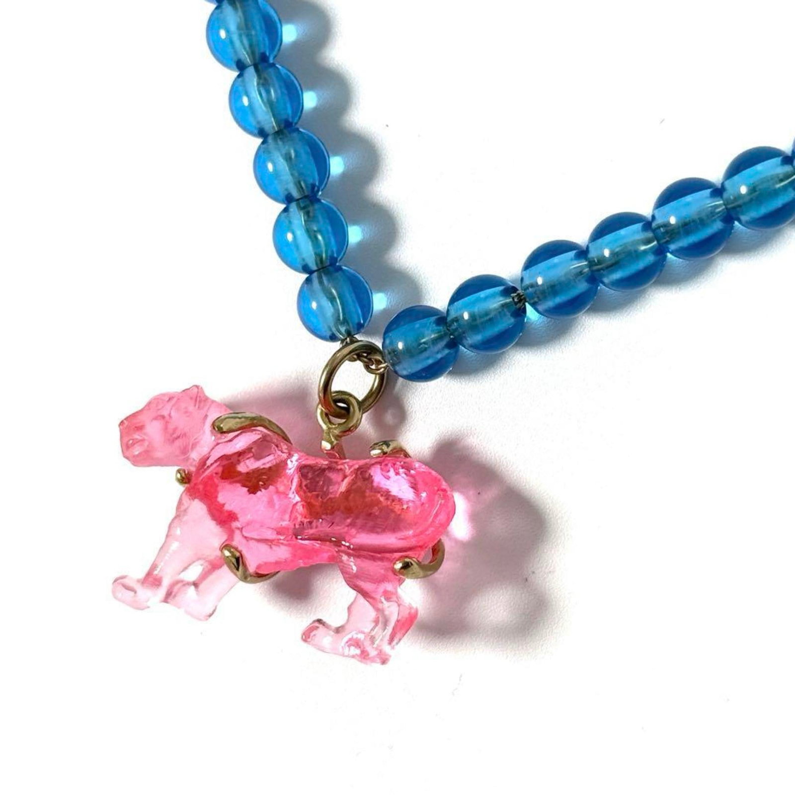 CHRISTIAN DIOR Metal Resin: CHRISTIAN DIOR Metal Resin Metal Resin Pendant from Christian Dior, a stylish choker necklace featuring a metal resin design. This necklace is made from metal and resin, with a neck circumference of 4