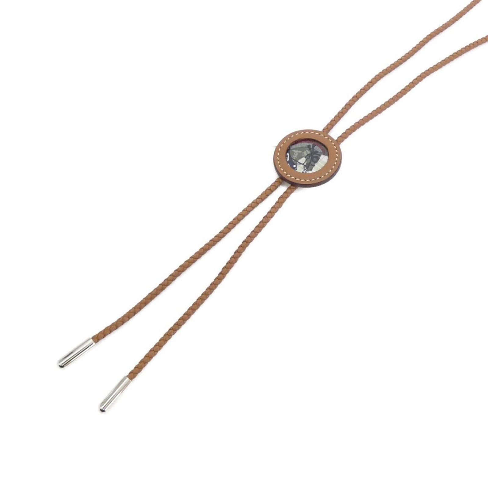 HERMES Palladium Swift Leather: HERMES Palladium Swift Leather Palladium Swift Leather necklace from Hermes, featuring a gold pendant with a 33mm x 33mm palladium setting, crafted from swift leather and suspended from a 78cm gold ch