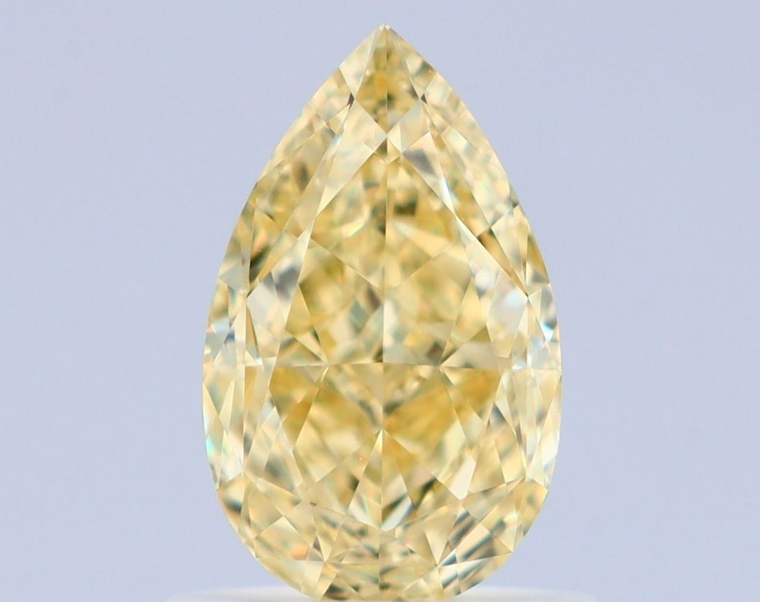 GIA Pear 1.03ct Fancy Yellow VVS2 - Loose Natural Diamond: GIA Pear 1.03ct Fancy Yellow VVS2 - Loose Natural Diamond GIA-certified Fancy Yellow 1.03ct VVS2 diamond offers exceptional clarity and color. Its natural beauty is showcased in its vibrant Fancy