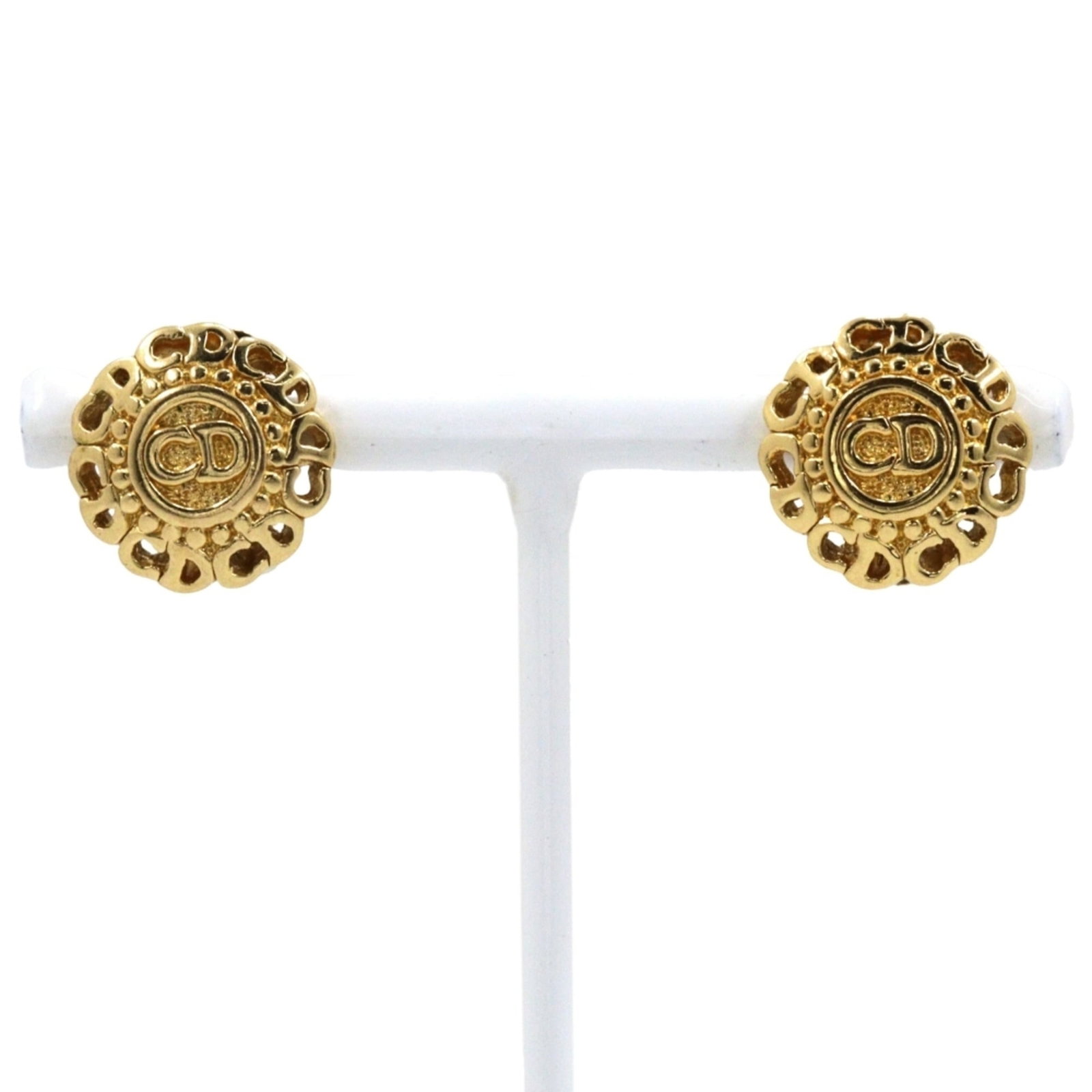 CHRISTIAN DIOR Clip Earrings Gold: CHRISTIAN DIOR Clip Earrings Gold Gold clip earrings from Christian Dior, featuring a sleek and sophisticated design. Made from high-quality gold, these earrings are gently used with minor signs of
