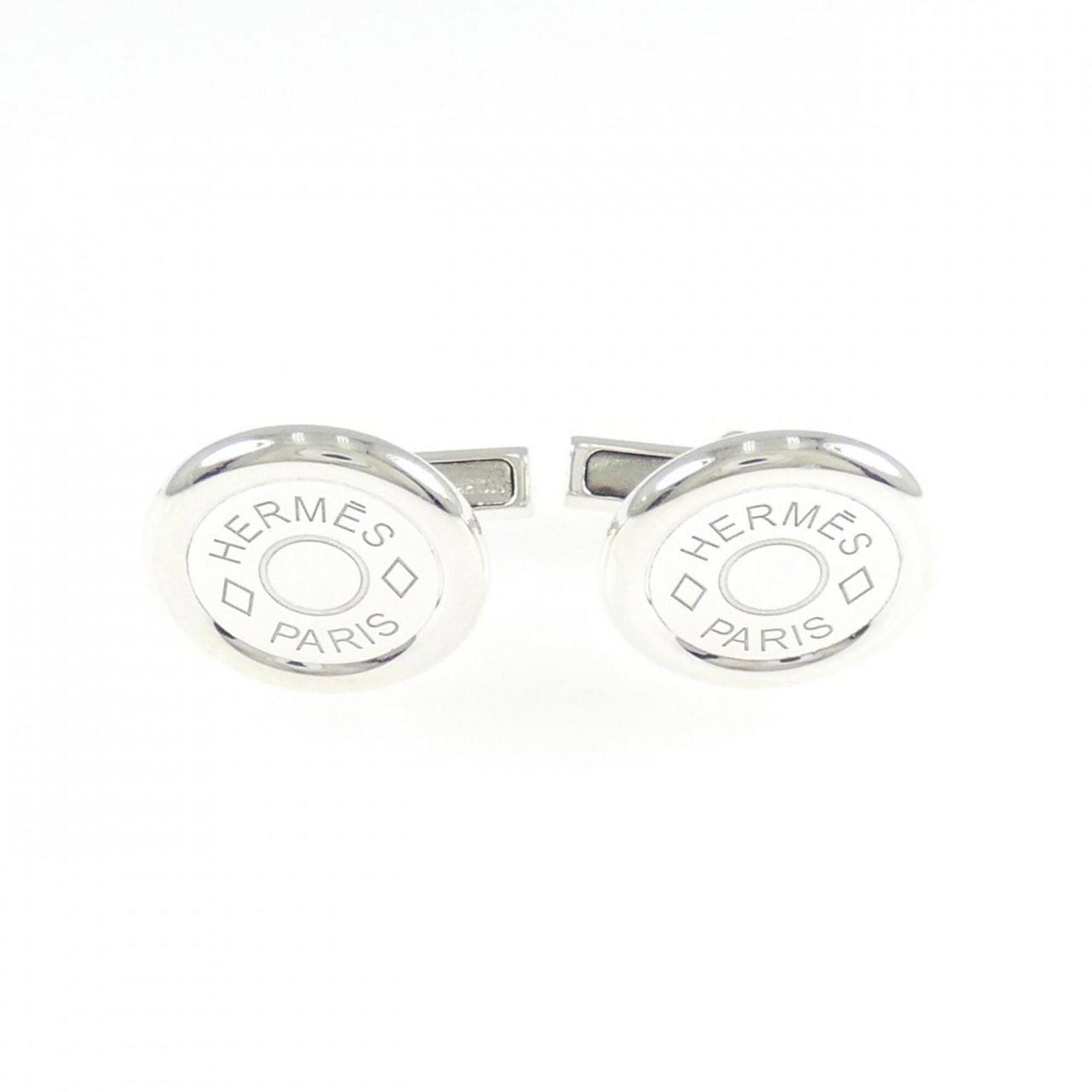 HERMES Cufflinks Silver 925: HERMES Cufflinks Silver 925 Silver 925 Hermes Cufflinks are a stylish accessory, featuring a sleek design that complements any outfit. Made from high-quality silver, these cufflinks are gently used