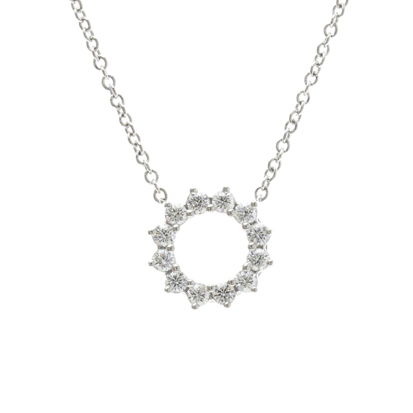 TIFFANY Platinum Silver: TIFFANY Platinum Silver Tiffany's Platinum Silver Open Circle Mini Necklace is a stylish fashion accessory featuring a 10mm x 10mm diamond pendant set in platinum. The necklace boasts a sleek design