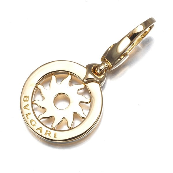 Bvlgari Pendant Tondo Sun Charm 18K 750 Yellow Gold: Bvlgari Pendant Tondo Sun Charm 18K 750 Yellow Gold 18k Yellow Gold Tondo Sun Charm Pendant from BVLGARI, featuring a unique charm design with a diameter of approximately 14.2mm. This elegant pendant