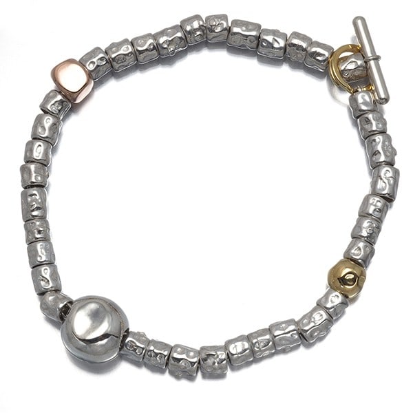 Pomellato Bracelet Dodo 18K Yg/9K Rg/Silver 925: Pomellato Bracelet Dodo 18K Yg/9K Rg/Silver 925 Multi-tone gold metal bracelet from Pomellato, featuring a unique multi-tone design. This 18k/9k gold bracelet is crafted from a combination of yellow